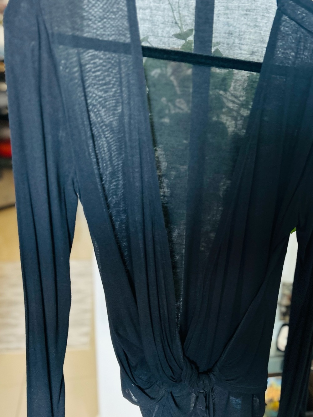 Sheer Black Twist-Front Long Sleeve Top. Flowing and elegant